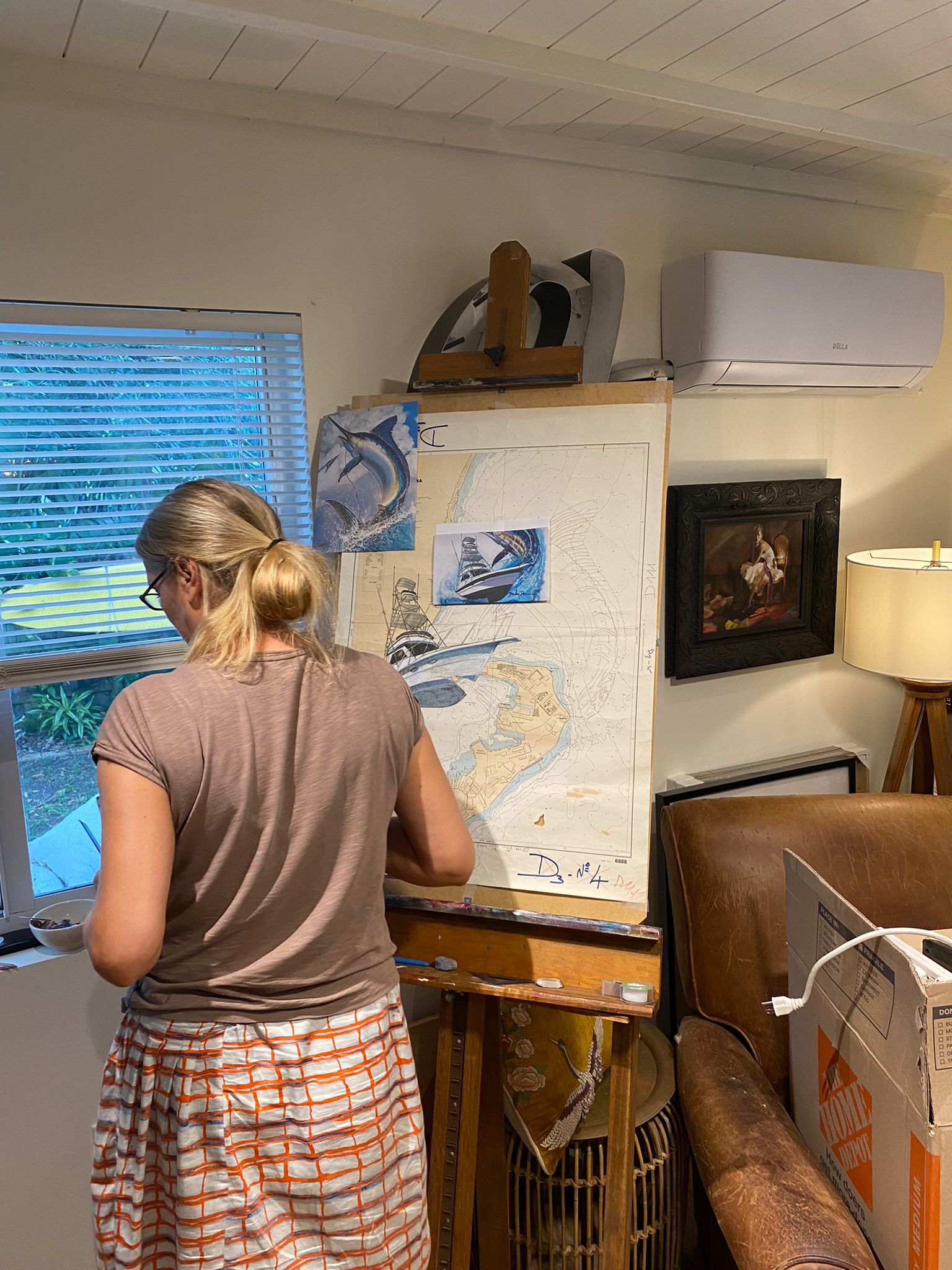 Studio view of Essebes painting marlin nautical chart